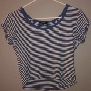 Cropped blue and white striped shirt.